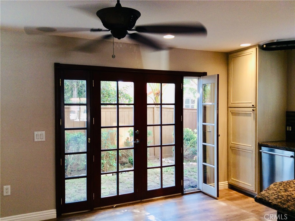 7 Mejorana Rancho Santa Margarita, CA 92688 - Photo 10 of 44 a view of a livingroom with a ceiling fan and window