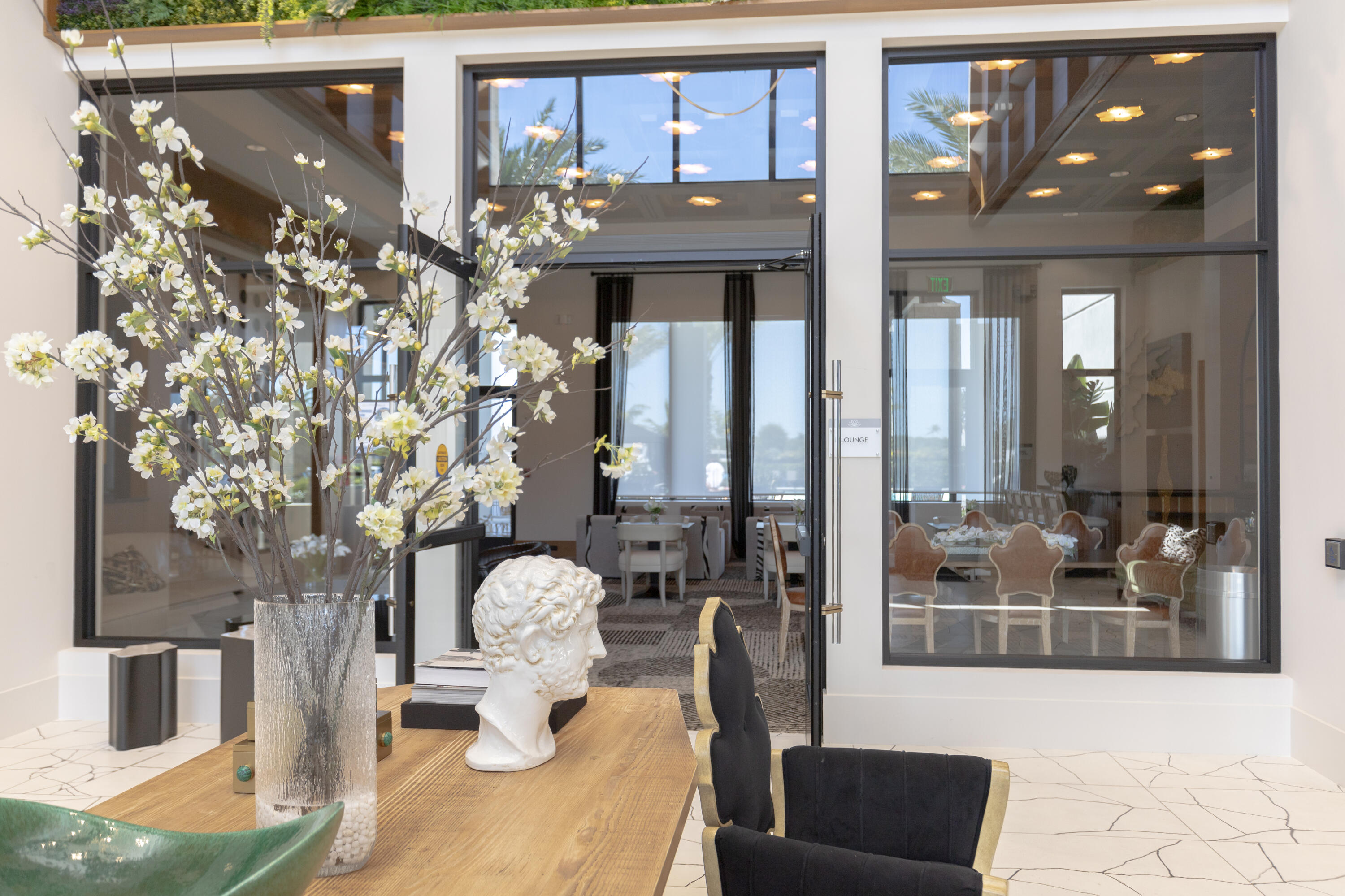 8252 Crystal Downs Avenue Boca Raton, FL 33434 - Photo 13 of 49 a front view of a house with dining table