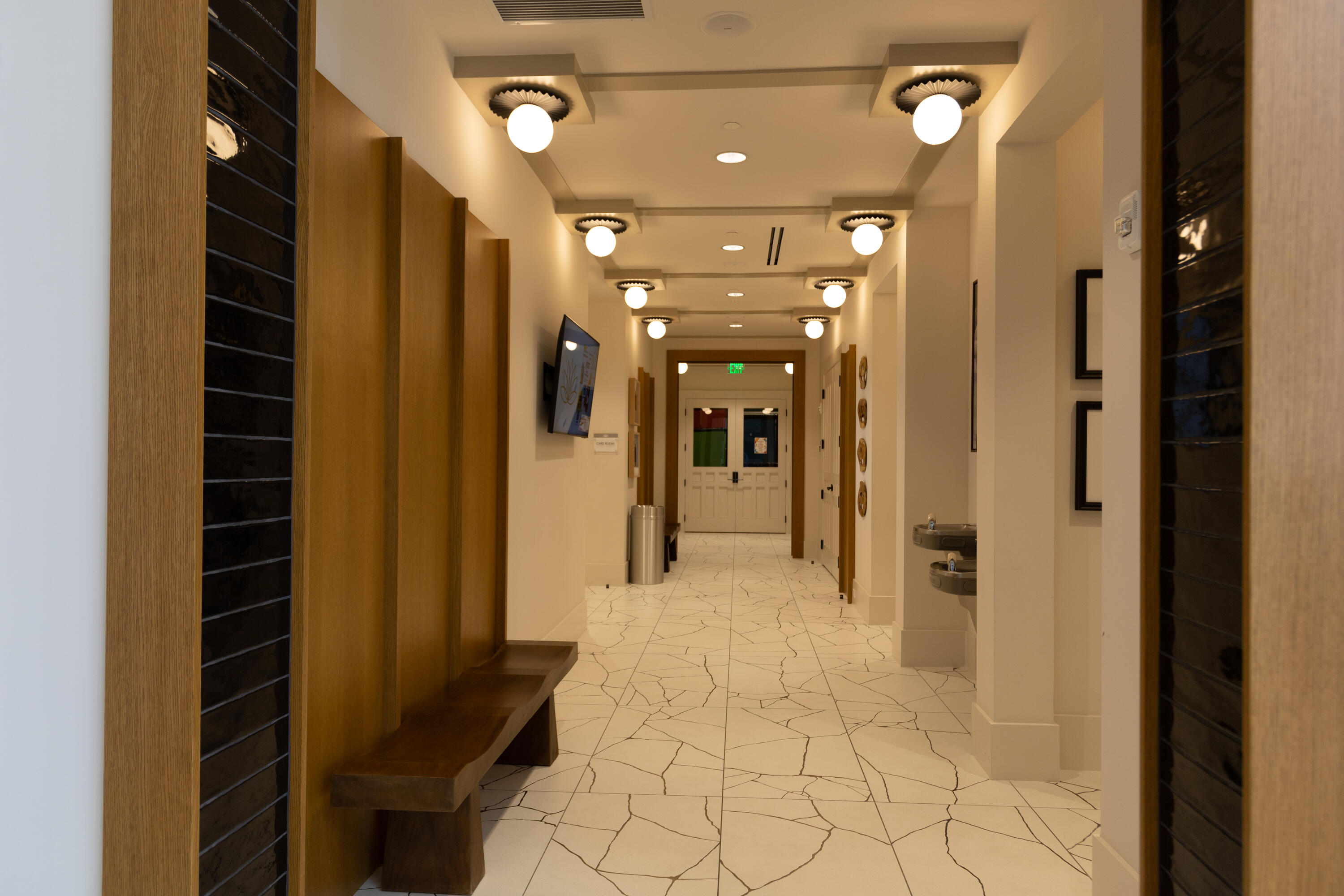 8252 Crystal Downs Avenue Boca Raton, FL 33434 - Photo 14 of 49 a view of a hallway with wooden shelves