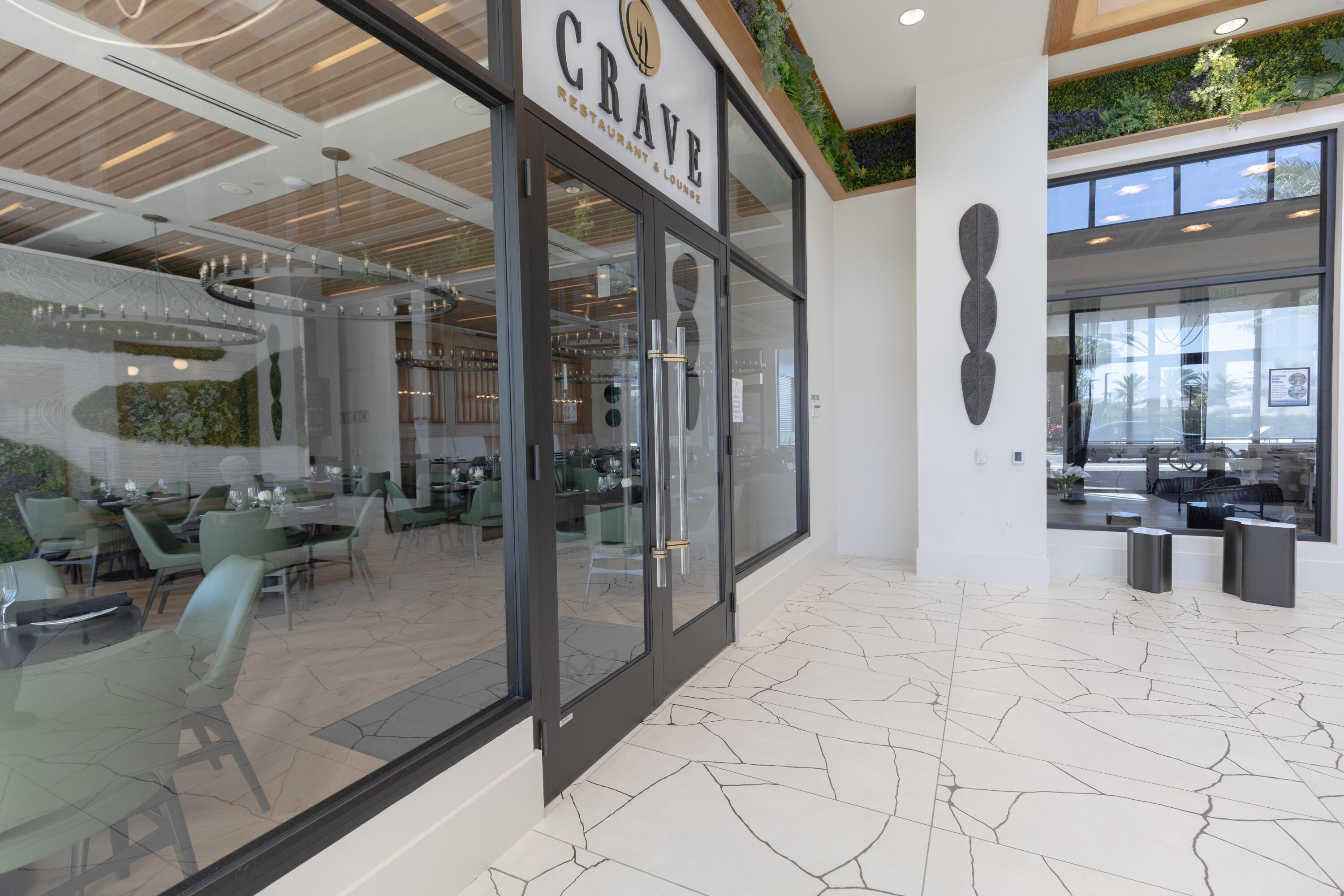 8252 Crystal Downs Avenue Boca Raton, FL 33434 - Photo 16 of 49 a view of a living room and entry way