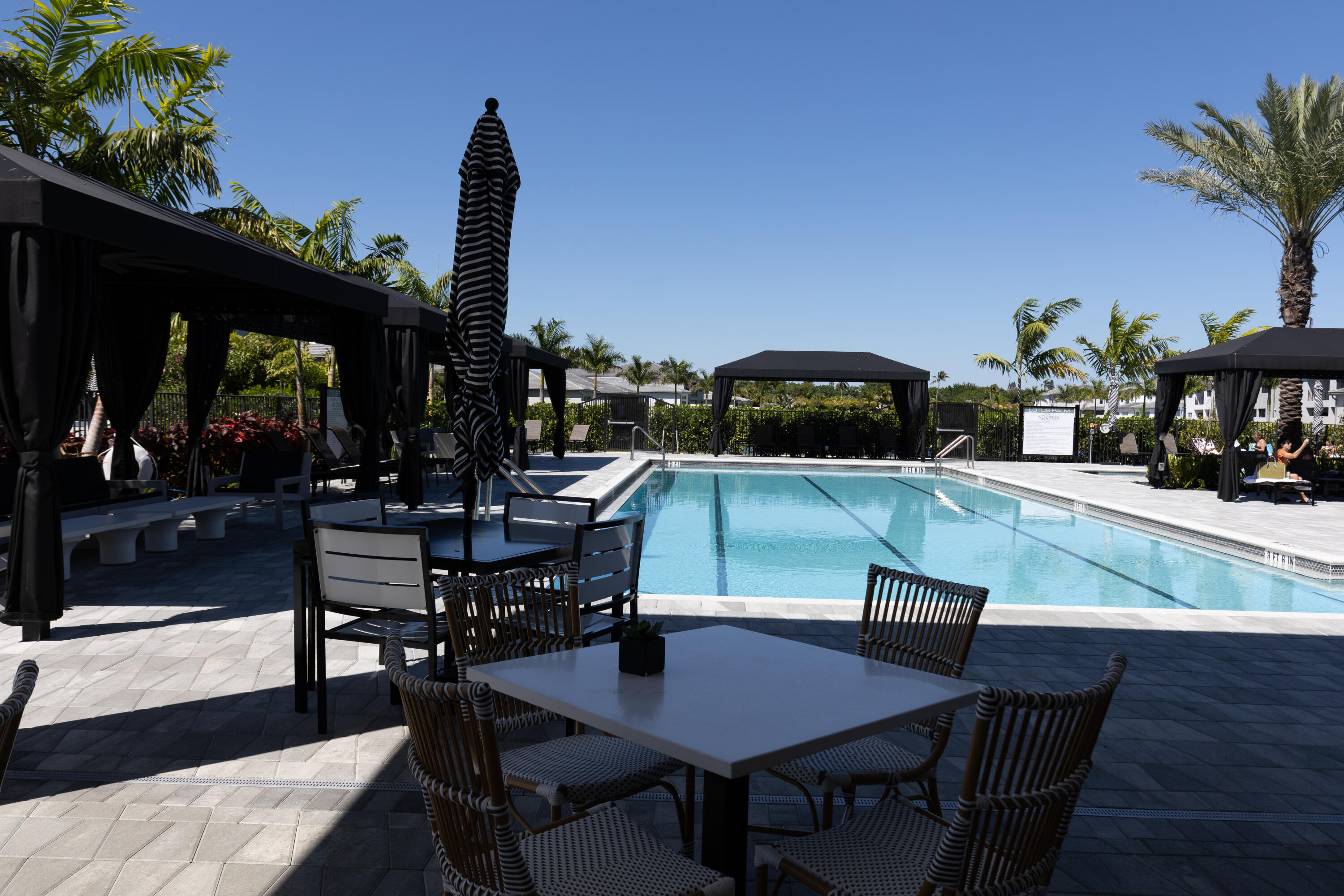 8252 Crystal Downs Avenue Boca Raton, FL 33434 - Photo 21 of 49 a view of a dining room with furniture and window