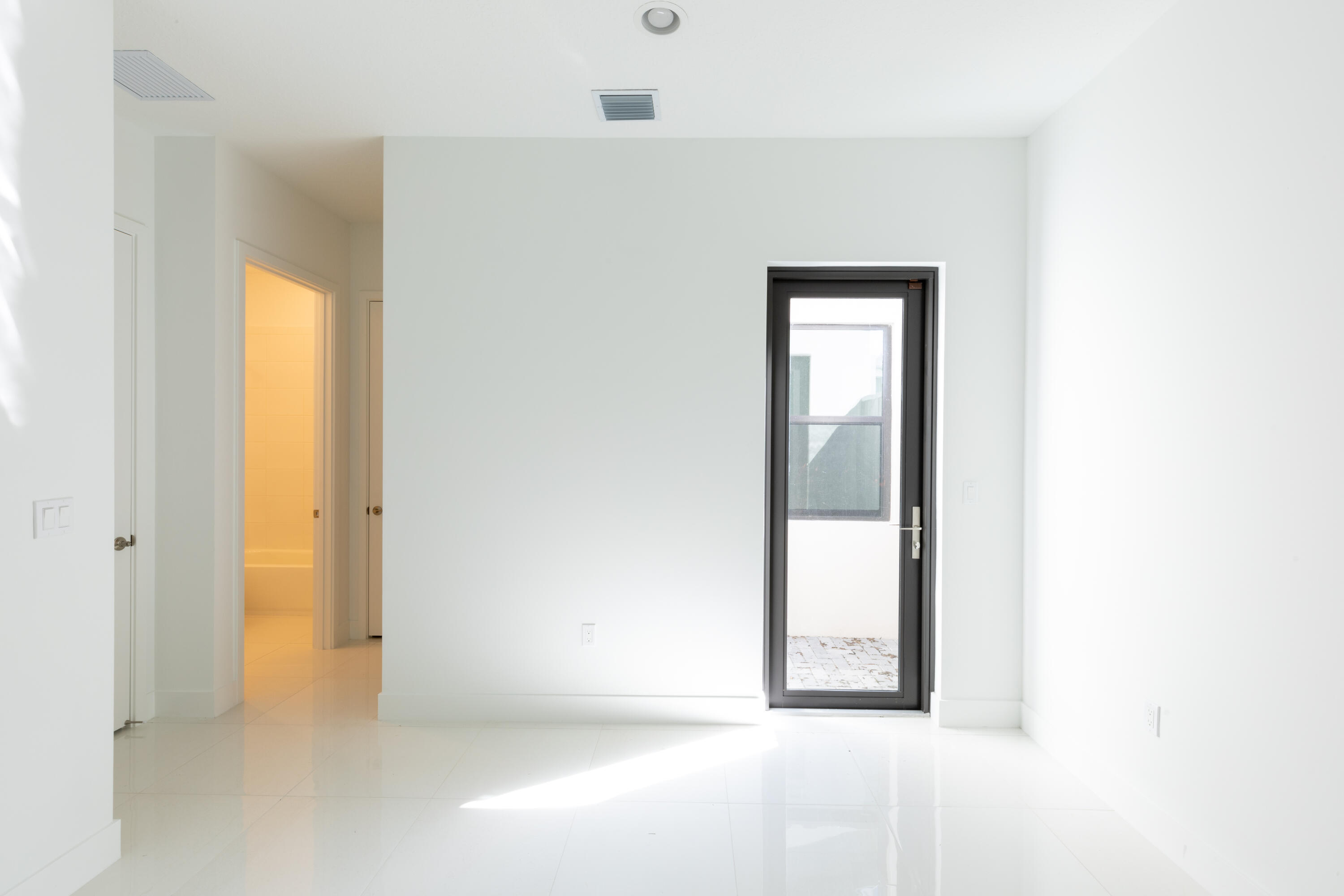 8252 Crystal Downs Avenue Boca Raton, FL 33434 - Photo 44 of 49 a view of an empty room with window