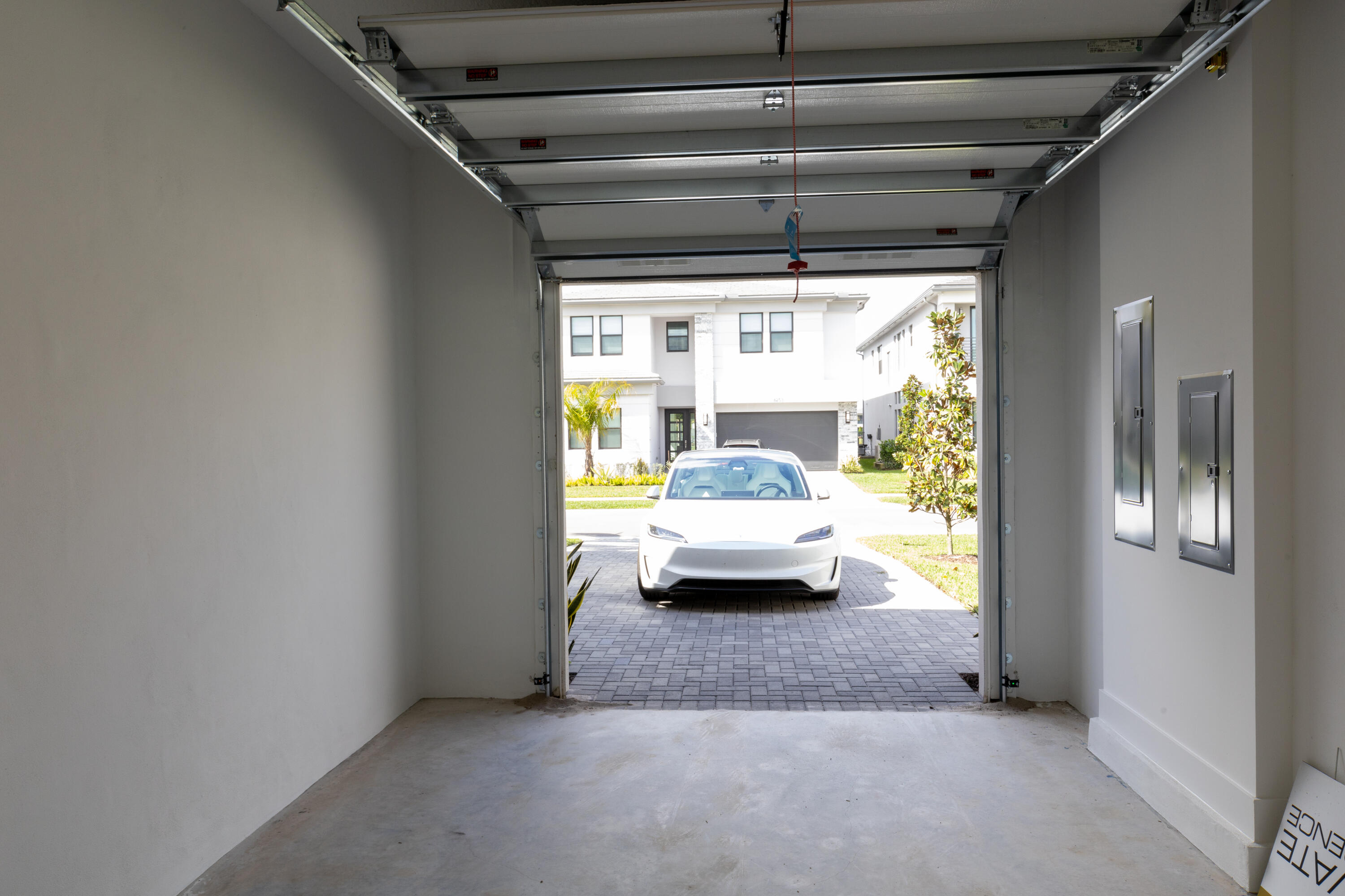 8252 Crystal Downs Avenue Boca Raton, FL 33434 - Photo 46 of 49 a car parked in parking garage