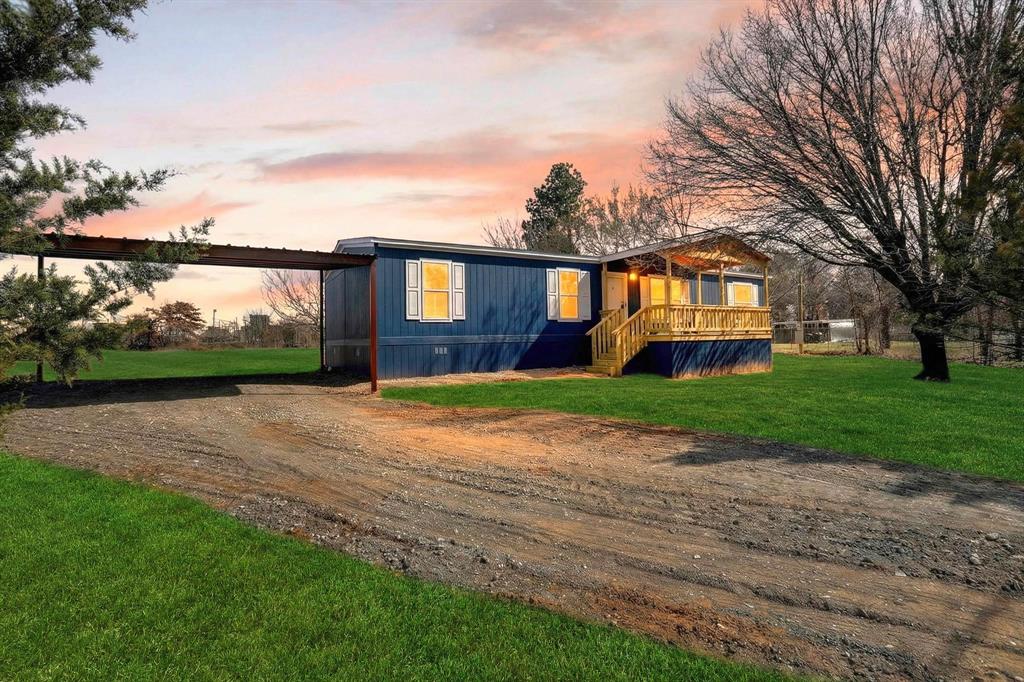 206 Rhett Court Aurora, TX 76078 - Photo 1 of 40 a front view of house with yard and green space