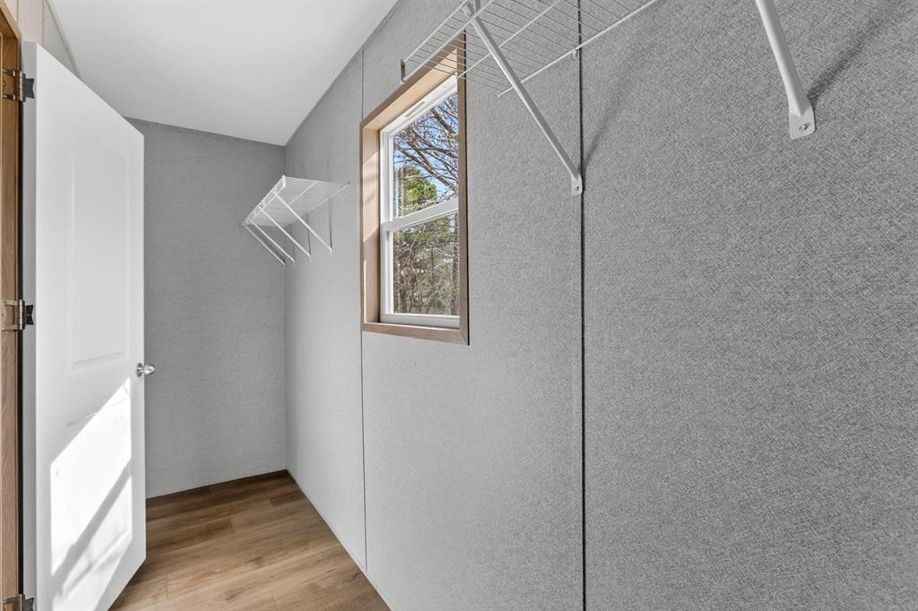 206 Rhett Court Aurora, TX 76078 - Photo 22 of 40 a view of entryway with wooden floor