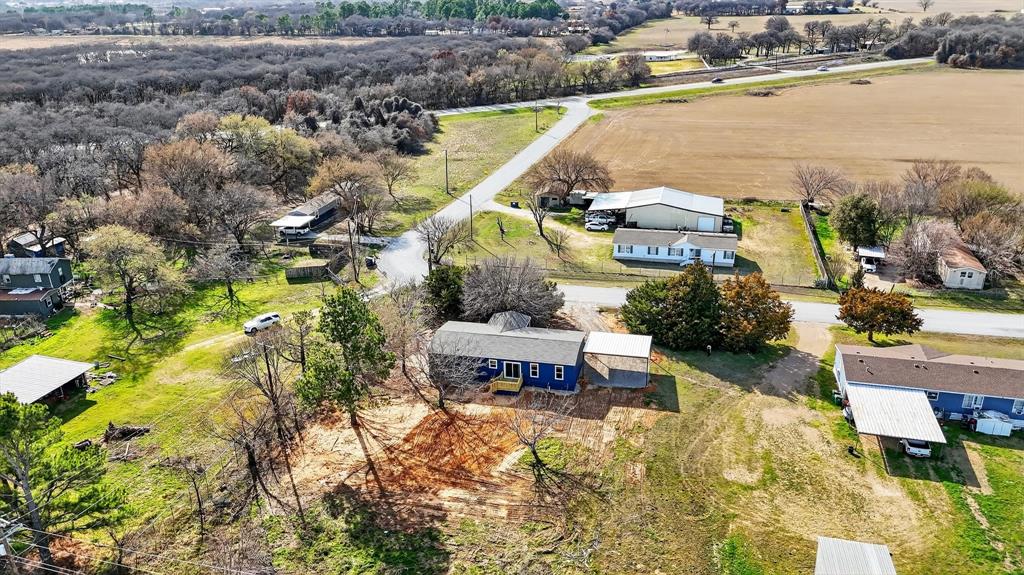 206 Rhett Court Aurora, TX 76078 - Photo 39 of 40 an aerial view of a house with a lake view