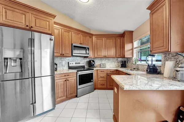 $540,000 | 7324 Northwest 1st Place, Plantation, FL 33317