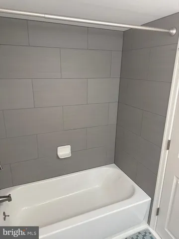 a bathroom with a bathtub