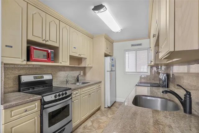 a bedroom with a bed and a night stand