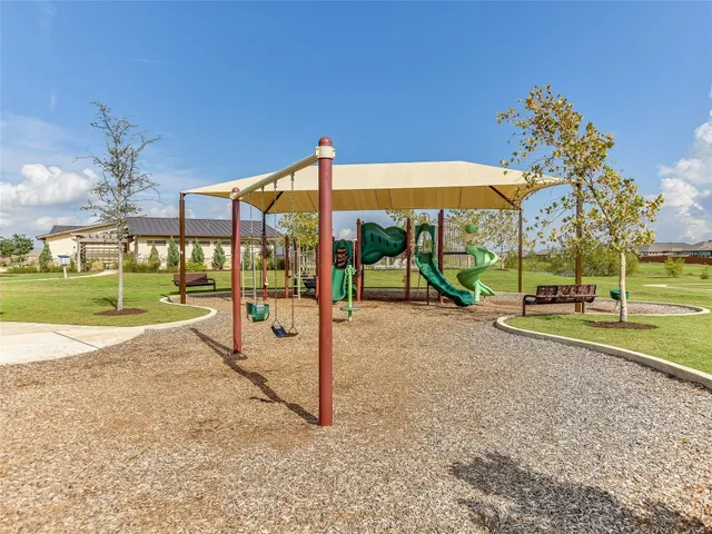 a view of a park with slide