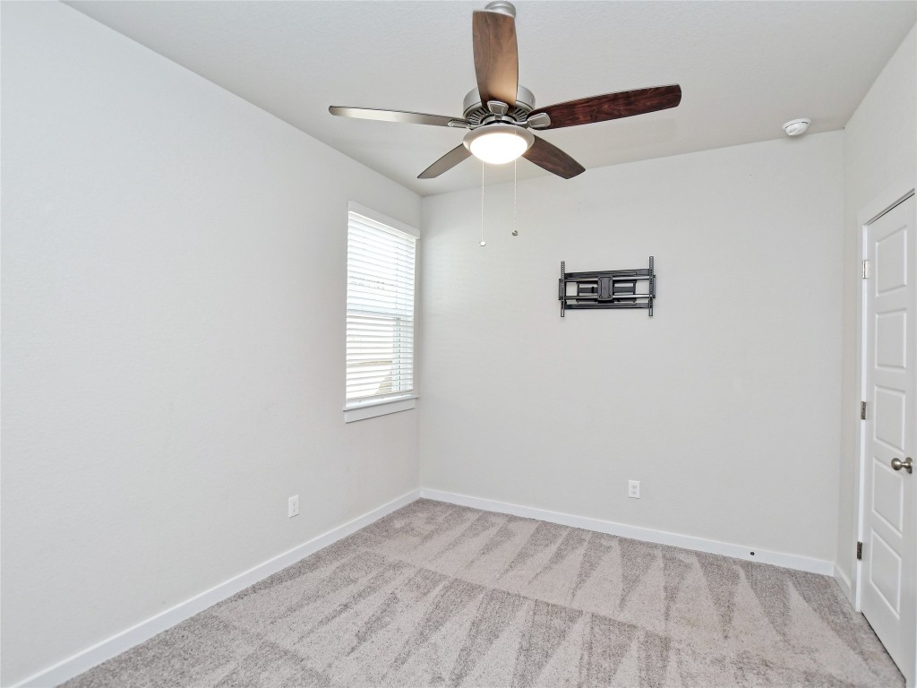1016 Paddock Lane Georgetown, TX 78626 - Photo 21 of 25 an empty room with a window