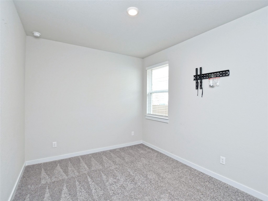 1016 Paddock Lane Georgetown, TX 78626 - Photo 23 of 25 an empty room with a window