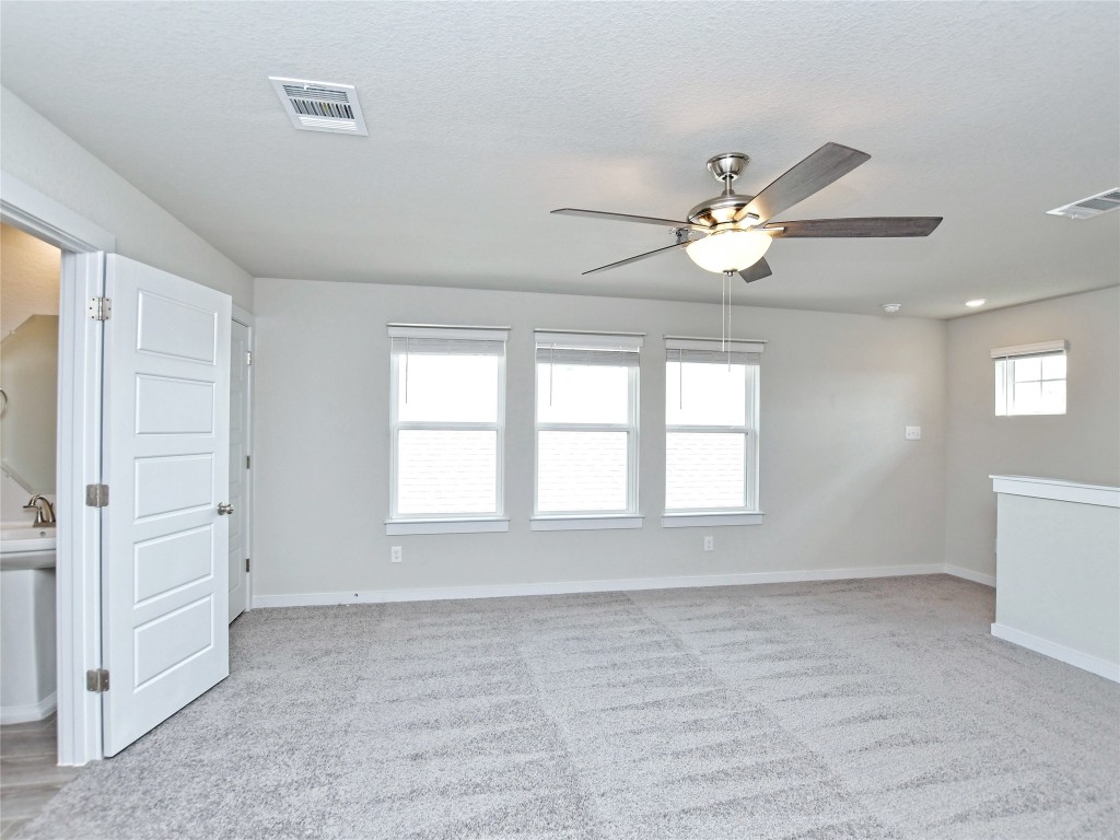 1016 Paddock Lane Georgetown, TX 78626 - Photo 24 of 25 a view of an empty room with a window