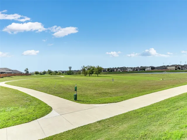a view of a lake with a big yard