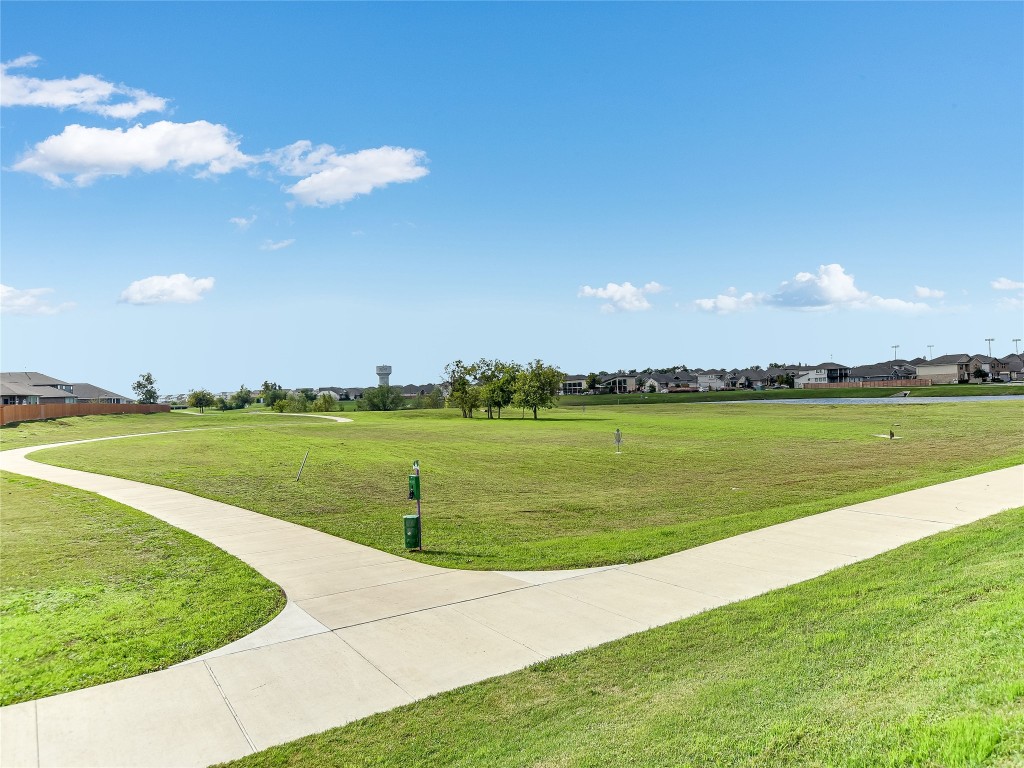 1016 Paddock Lane Georgetown, TX 78626 - Photo 6 of 25 a view of a lake with a big yard