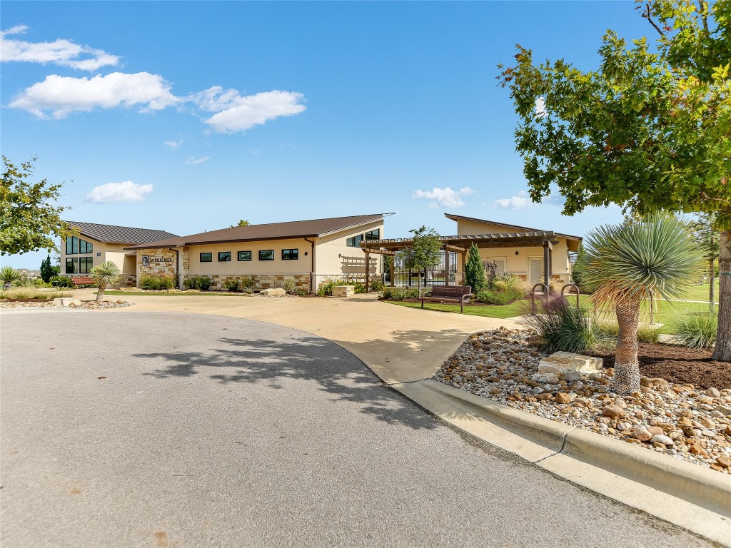 1016 Paddock Lane Georgetown, TX 78626 - Photo 9 of 25 a front view of a house with garden