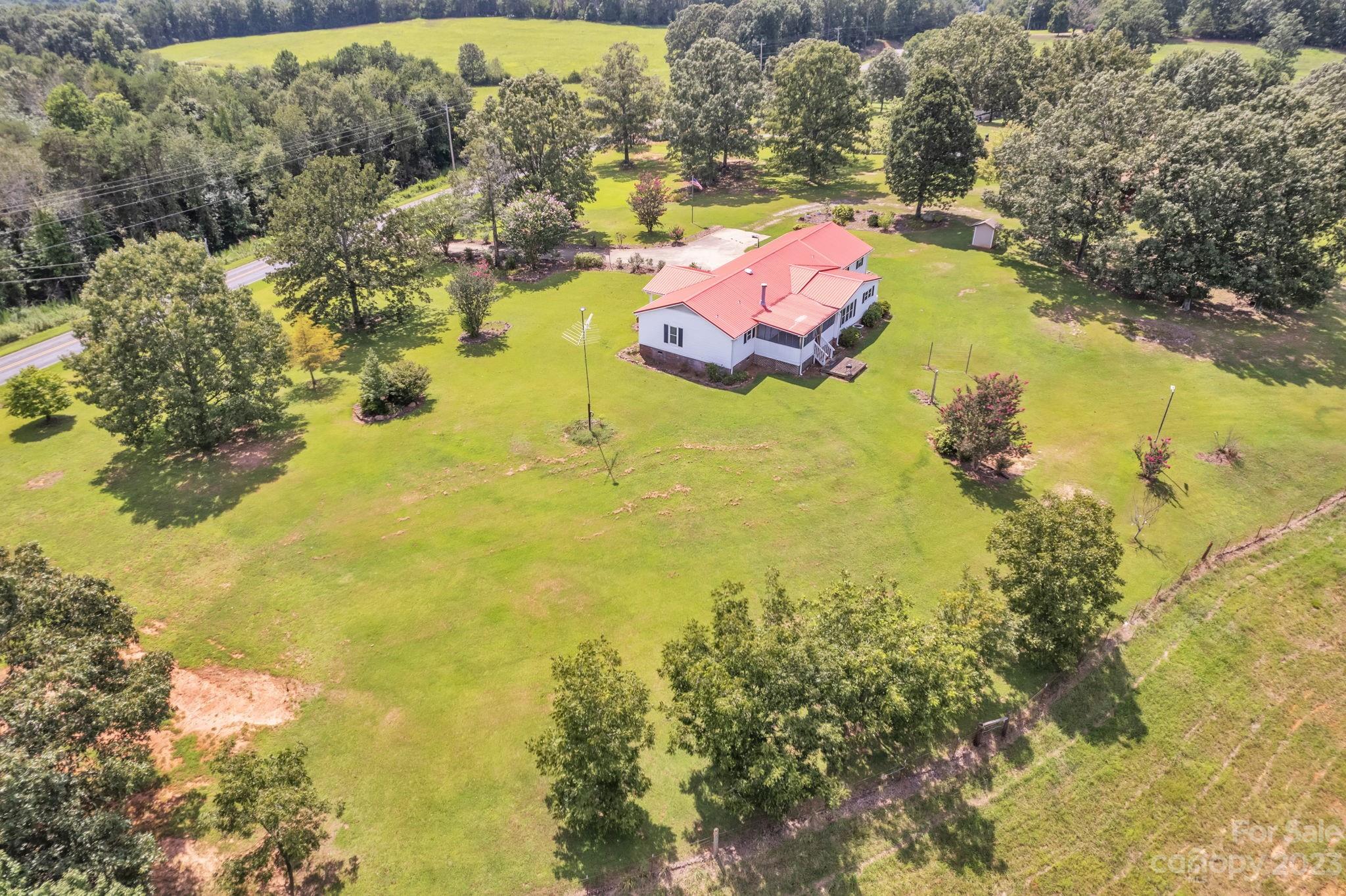 348 West V Thompson Road Rutherfordton, NC 28139 - Photo 24 of 31 a view of residential houses with swimming pool
