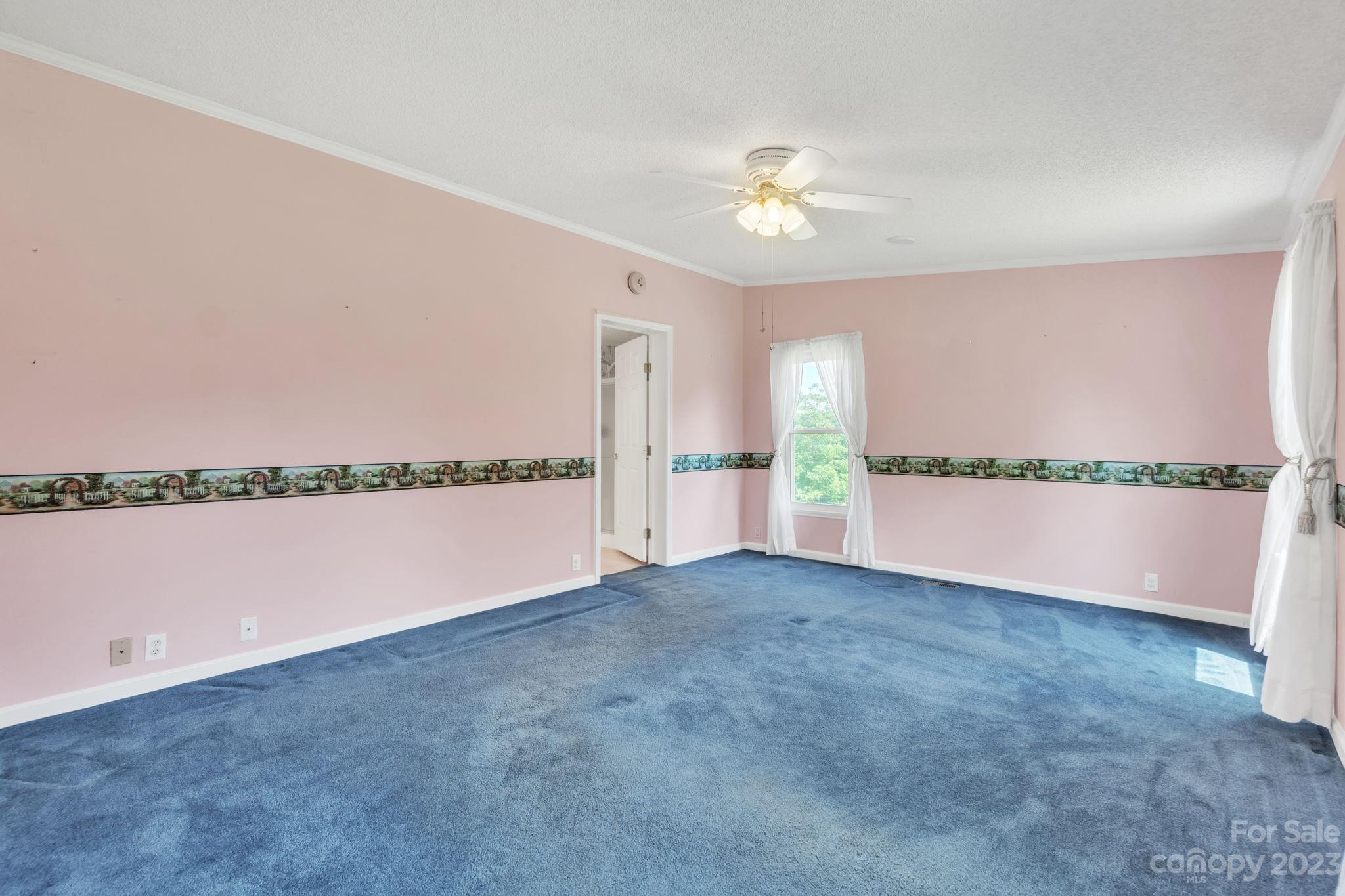 348 West V Thompson Road Rutherfordton, NC 28139 - Photo 8 of 31 a view of a room with an empty space and a window