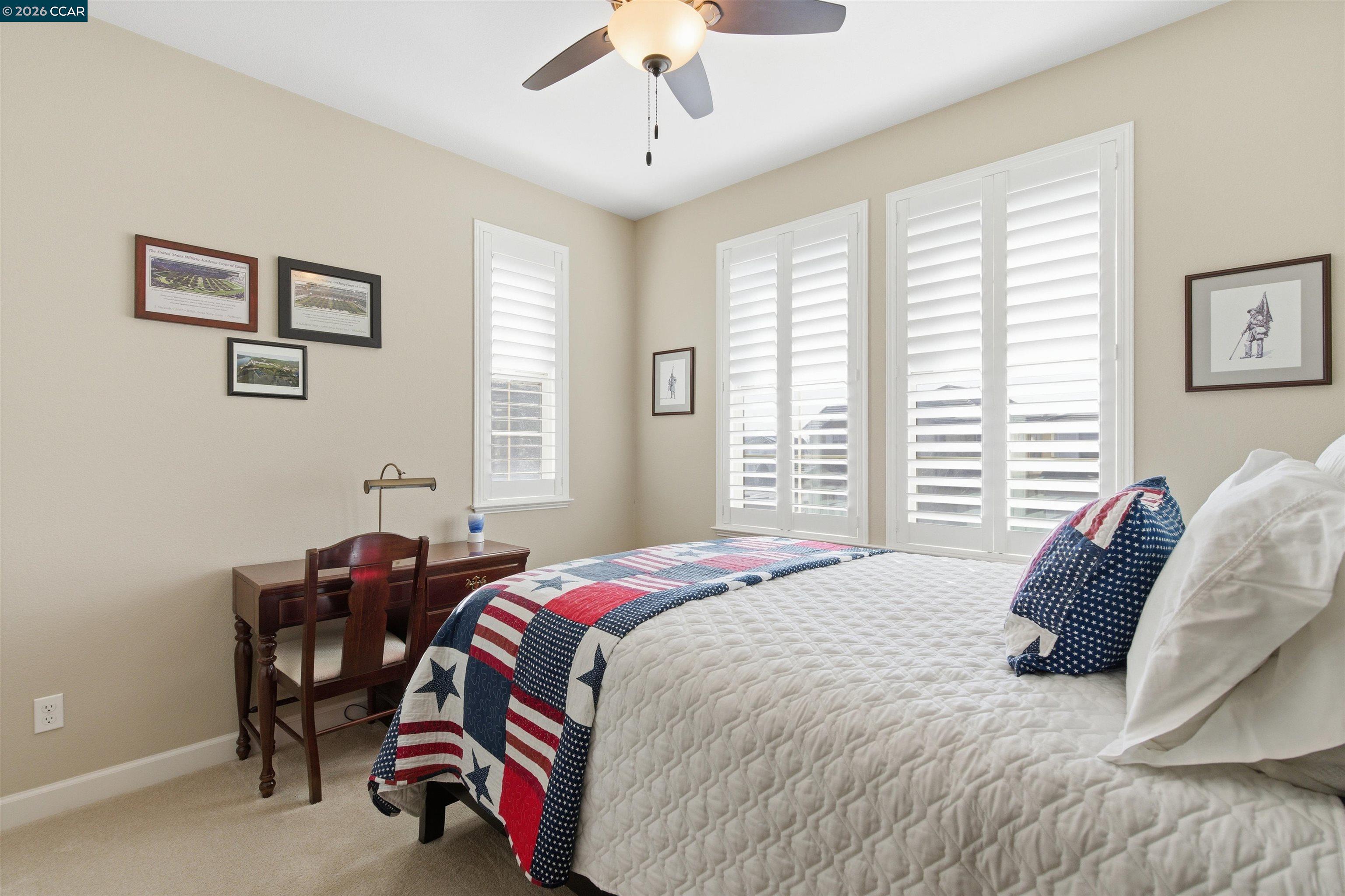 9927 Reimers Way Dublin, CA 94568 - Photo 30 of 39 a bedroom with a bed and a window