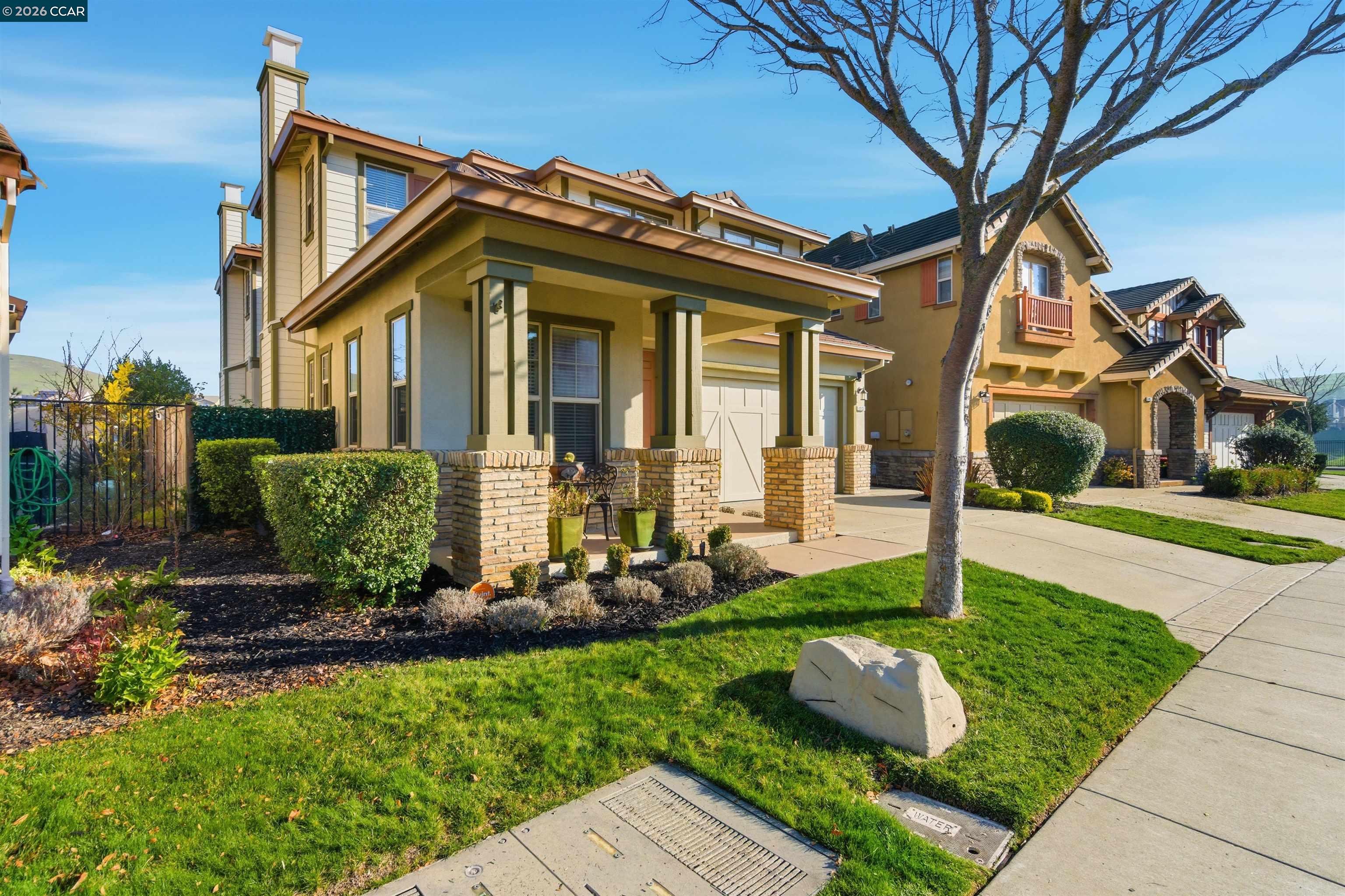 9927 Reimers Way Dublin, CA 94568 - Photo 3 of 39 a front view of a house with garden