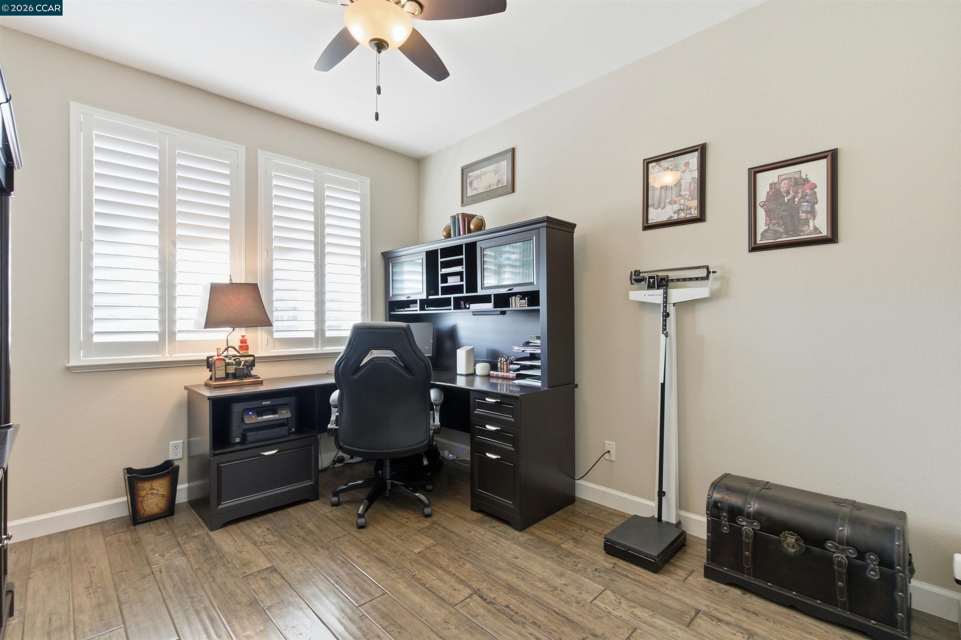 9927 Reimers Way Dublin, CA 94568 - Photo 31 of 39 a view of a workspace with furniture and a window