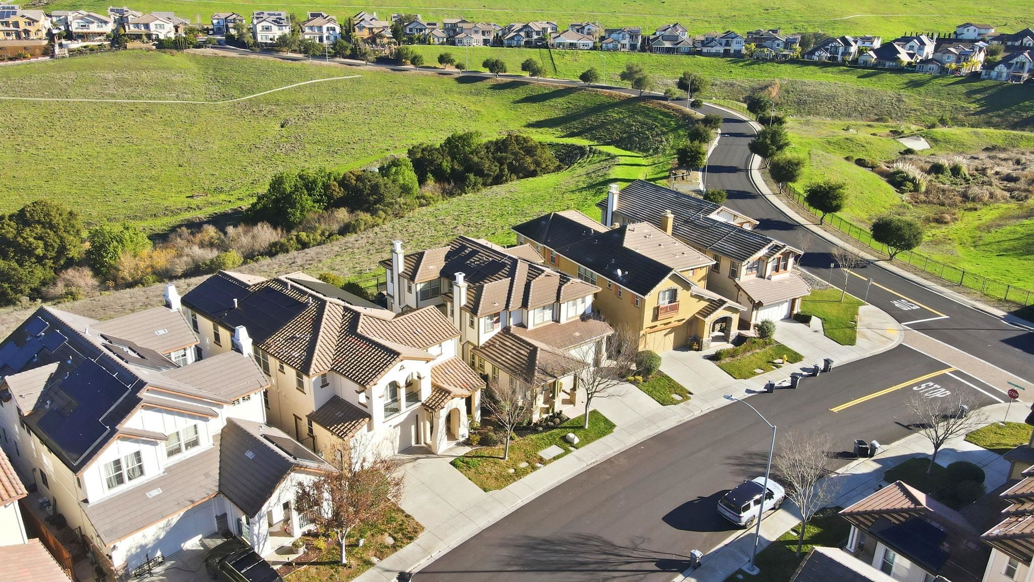 9927 Reimers Way Dublin, CA 94568 - Photo 10 of 39 an aerial view of residential houses with outdoor space