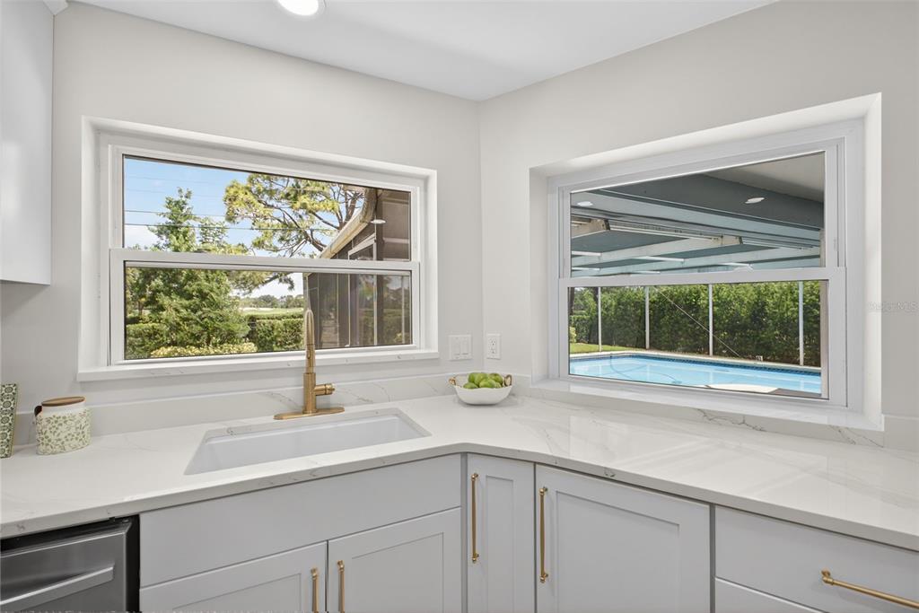 656 Mehlenbacher Road Belleair, FL 33756 - Photo 13 of 49 a sink with a window