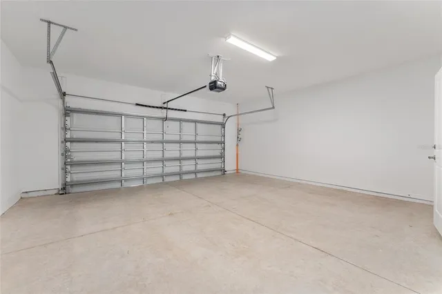 a view of a car is parked in front of a building