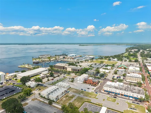 swimming pool view with a seating space
