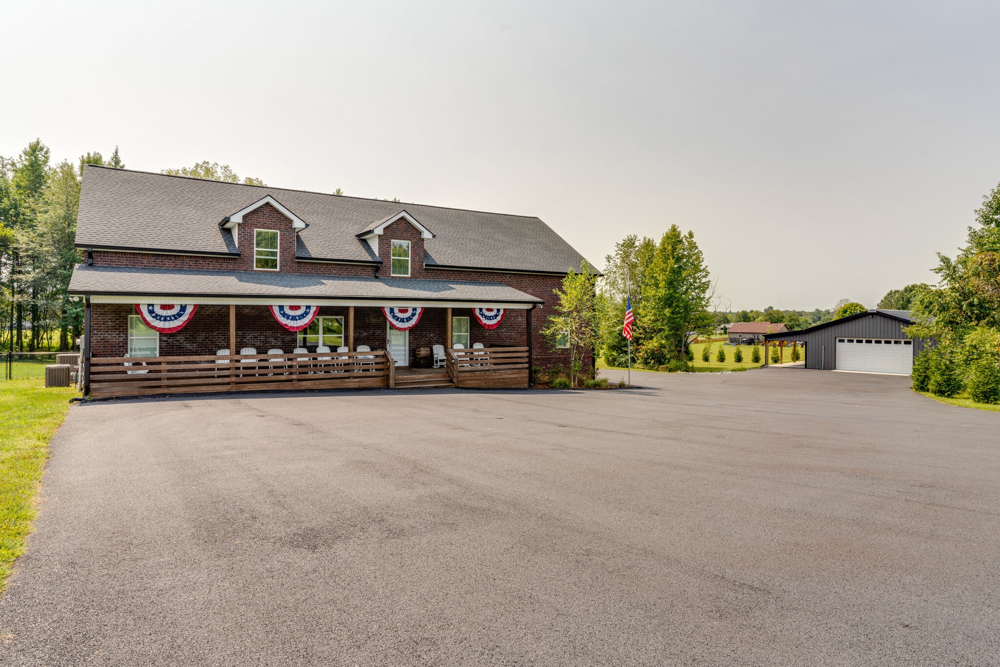 604 Fowler Ford Road Portland, TN 37148 - Photo 2 of 43 a front view of a house with a yard and a garage
