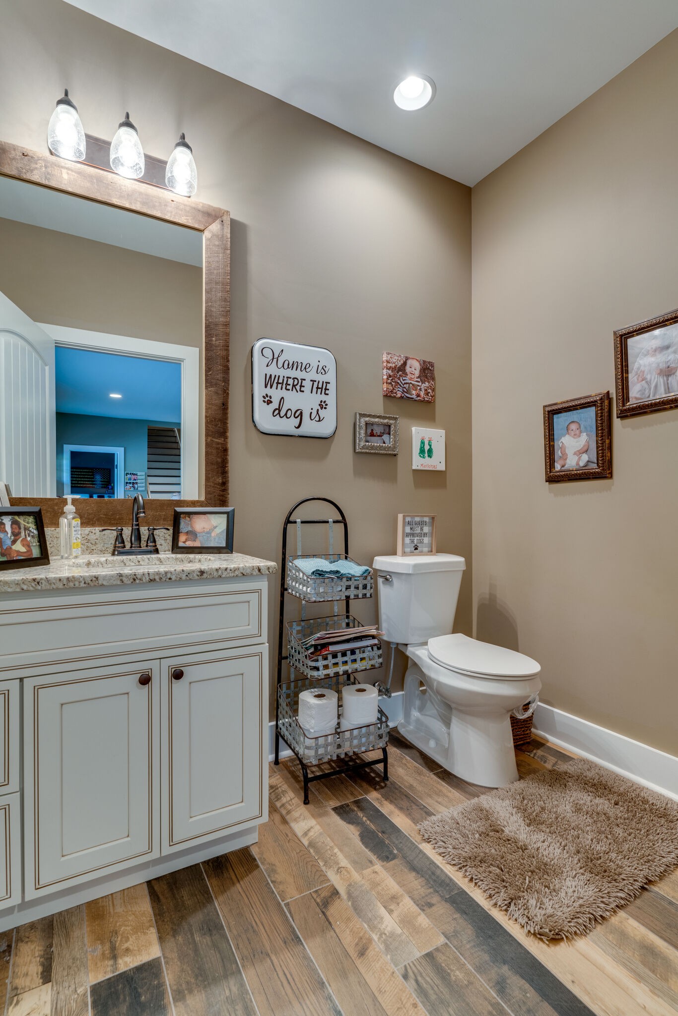 604 Fowler Ford Road Portland, TN 37148 - Photo 12 of 43 a living room with furniture a toilet and a sink