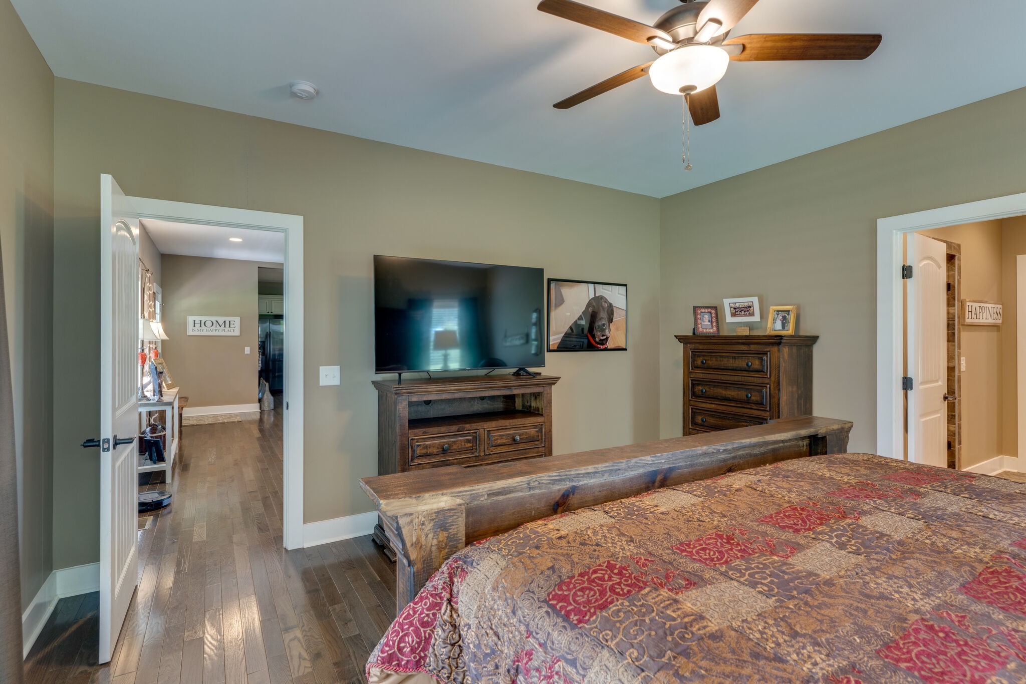 604 Fowler Ford Road Portland, TN 37148 - Photo 15 of 43 a bedroom with a bed and a flat screen tv