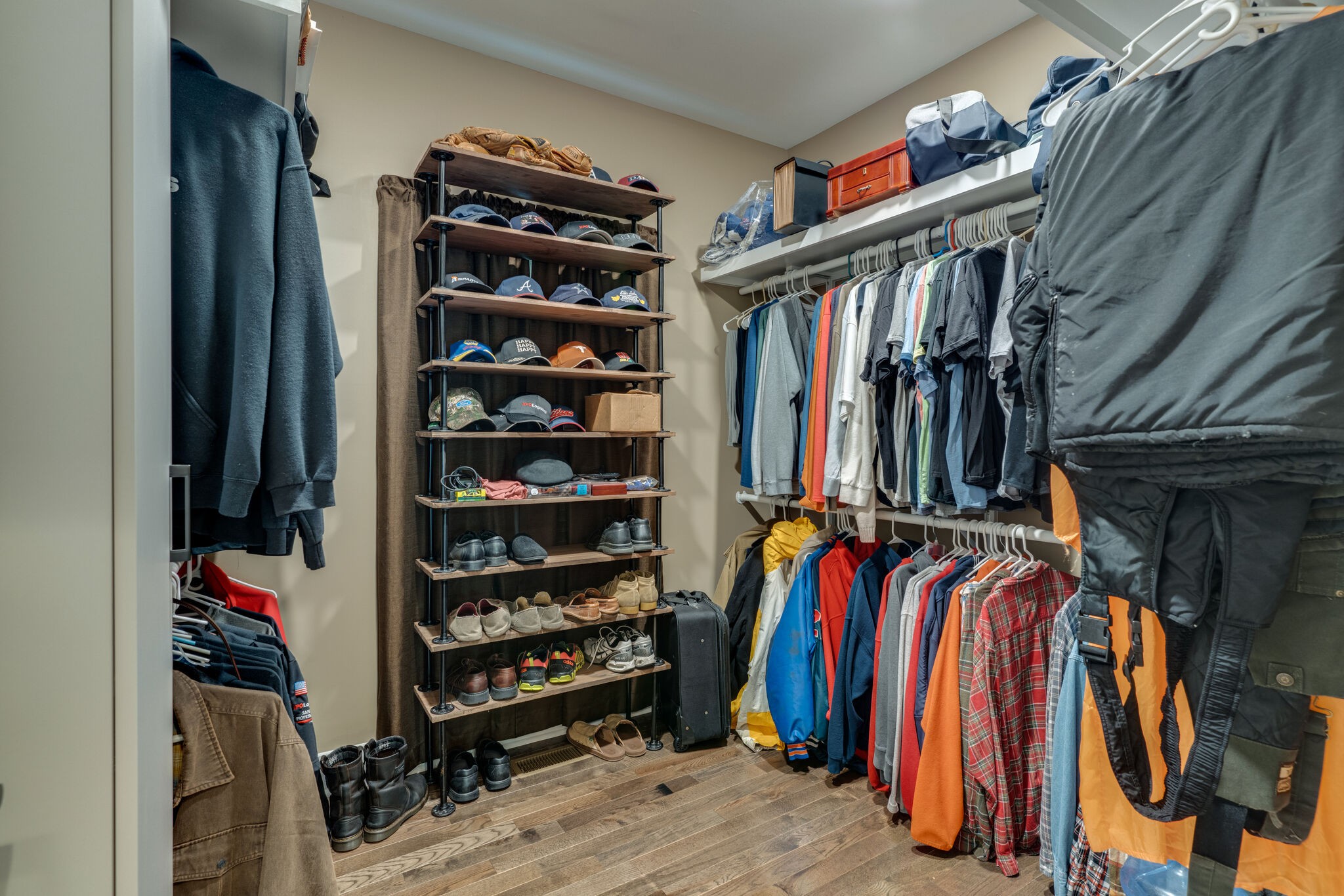 604 Fowler Ford Road Portland, TN 37148 - Photo 17 of 43 a view of walk in closet with clothes and shoes