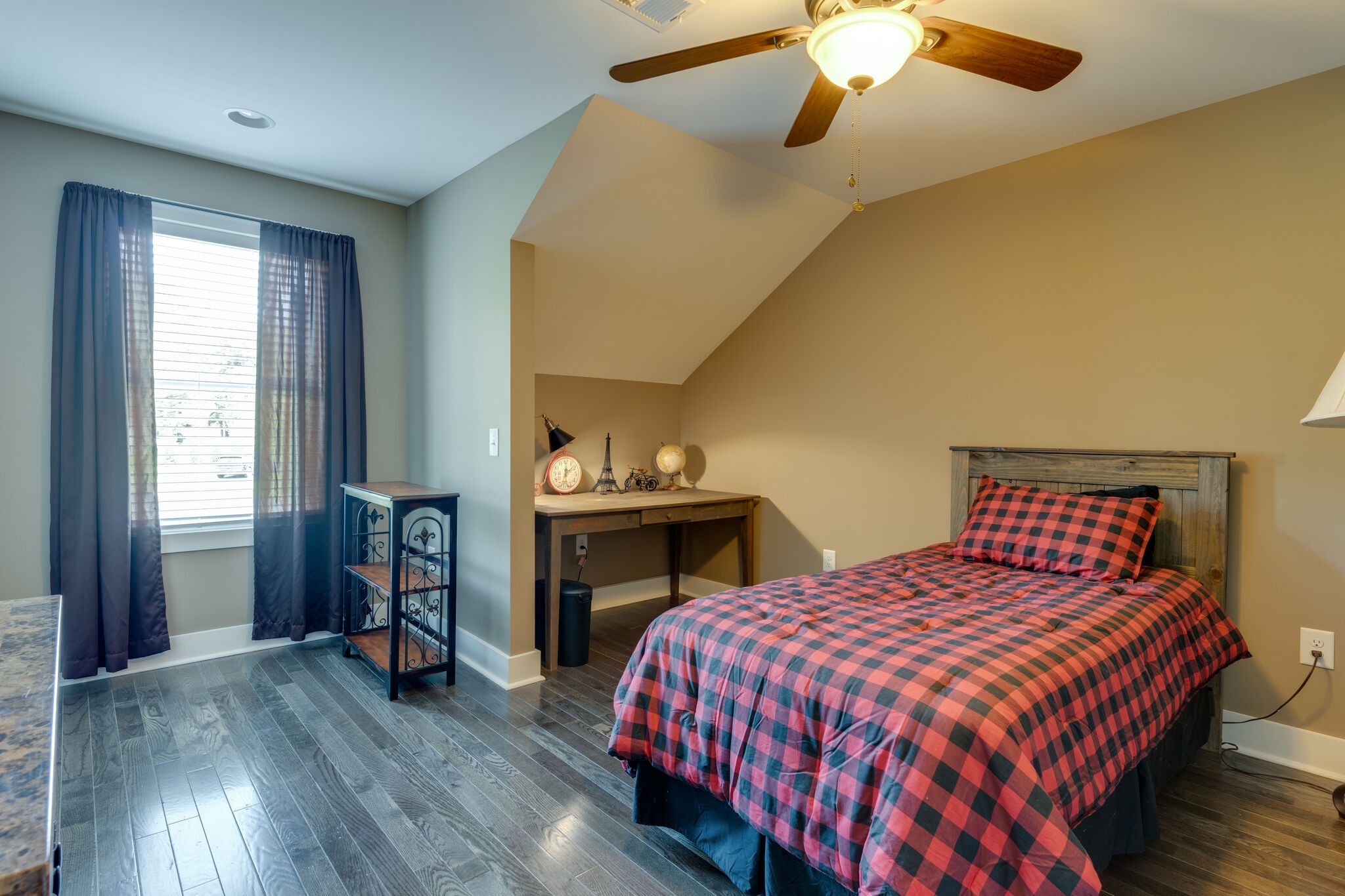 604 Fowler Ford Road Portland, TN 37148 - Photo 23 of 43 a bedroom with a bed and a fireplace
