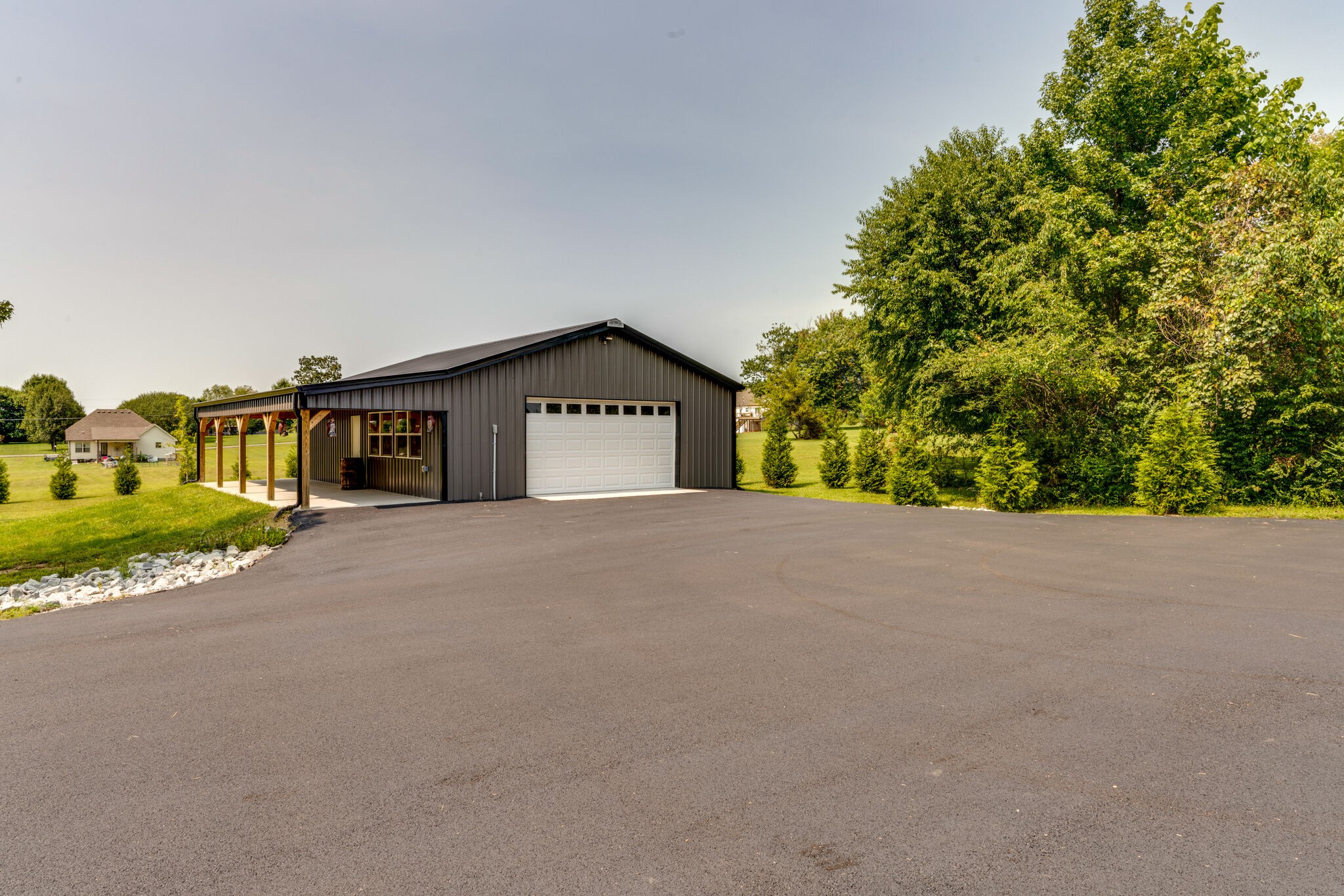 604 Fowler Ford Road Portland, TN 37148 - Photo 38 of 43 a view of a house with a yard and garage