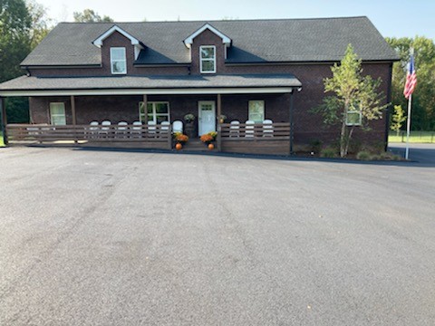 604 Fowler Ford Road Portland, TN 37148 - Photo 42 of 43 a front view of a building with street
