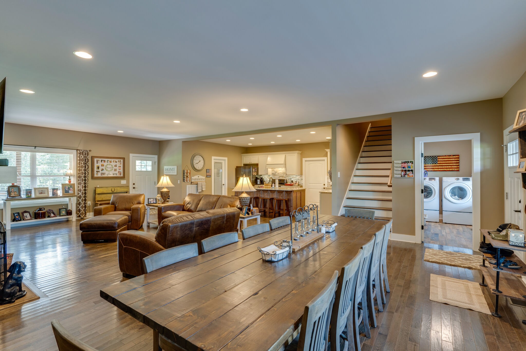 604 Fowler Ford Road Portland, TN 37148 - Photo 6 of 43 a living room with furniture kitchen view and a wooden floor