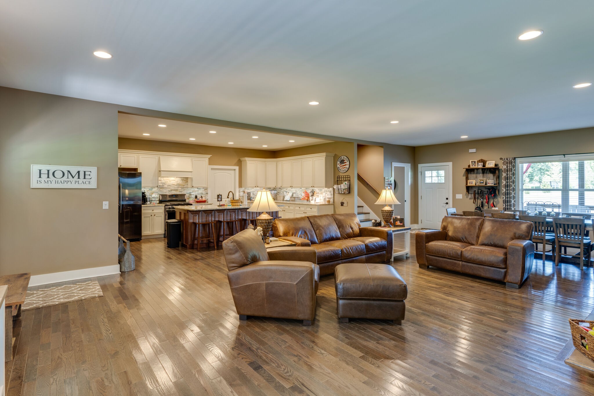 604 Fowler Ford Road Portland, TN 37148 - Photo 7 of 43 a living room with furniture and a wooden floor