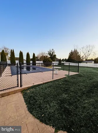 a view of a garden with an outdoor space