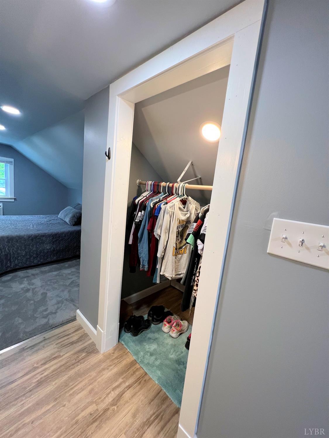 514 Smith Road Hurt, VA 24563 - Photo 23 of 59 a view of walk in closet with clothes and shoes