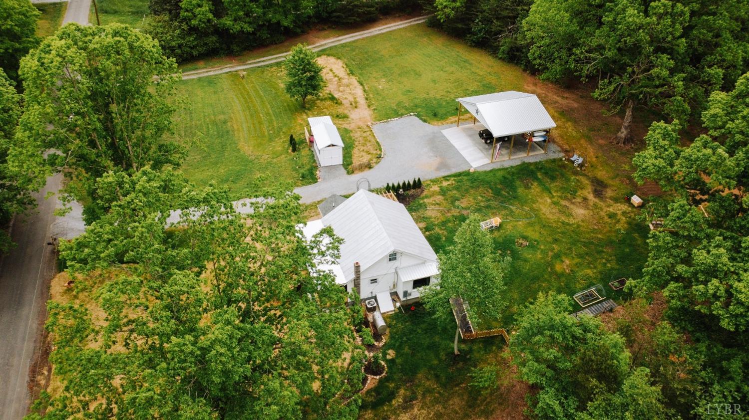 514 Smith Road Hurt, VA 24563 - Photo 50 of 59 an aerial view of residential house with outdoor space and trees all around