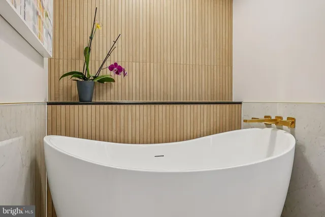 a view of a bathtub in a bathroom