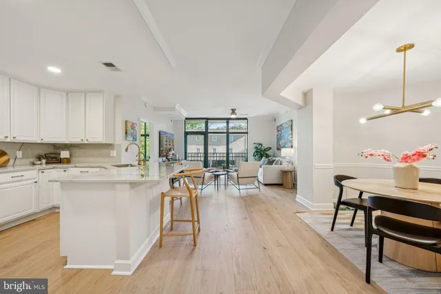 a view of a kitchen and dining room