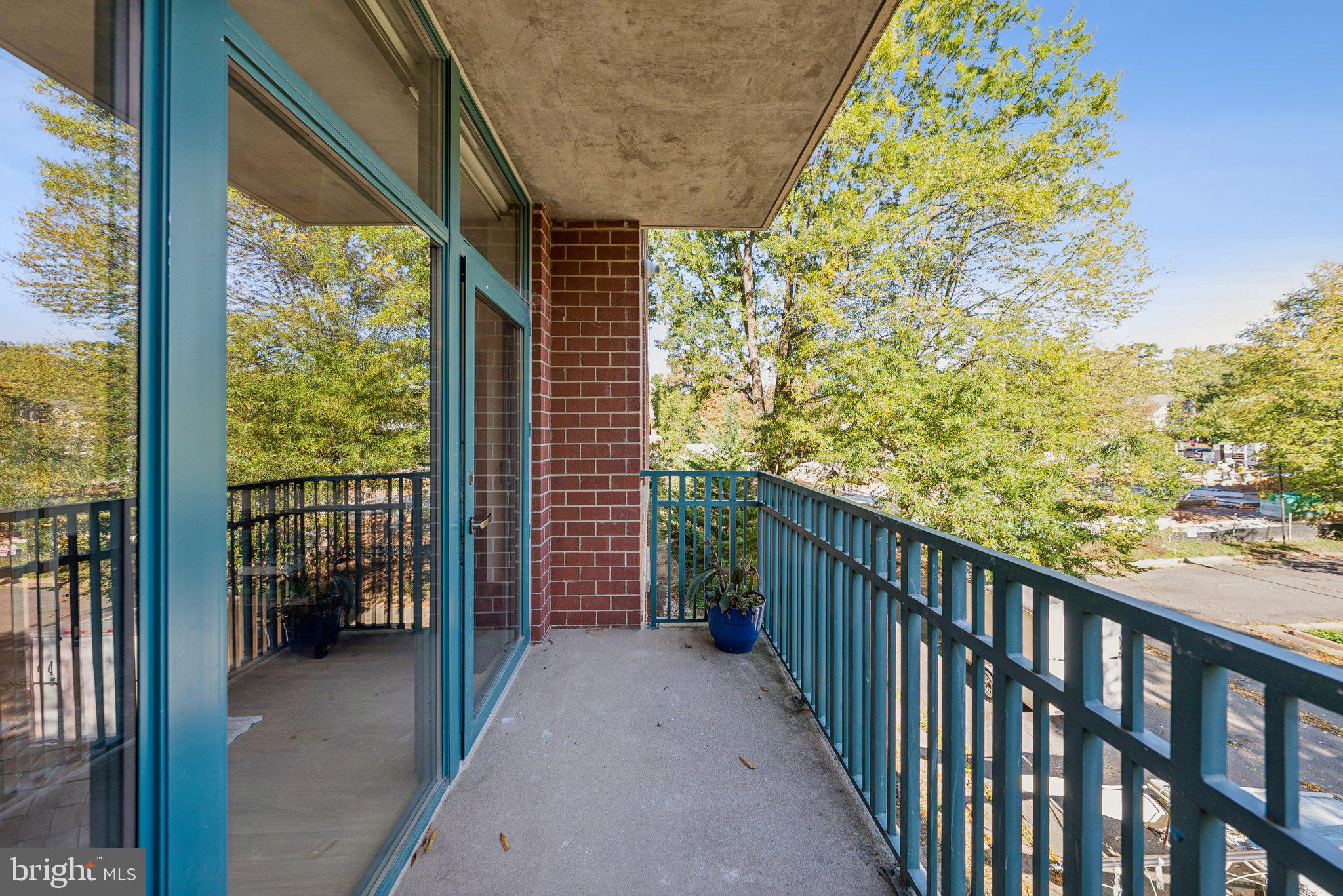502 West Broad Street, Unit 215 Falls Church, VA 22046 - Photo 32 of 40 a view of balcony with wooden floor