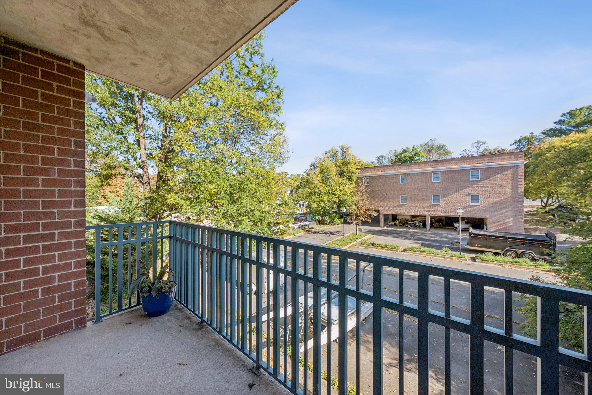 502 West Broad Street, Unit 215 Falls Church, VA 22046 - Photo 33 of 40 a view of a balcony with an outdoor space