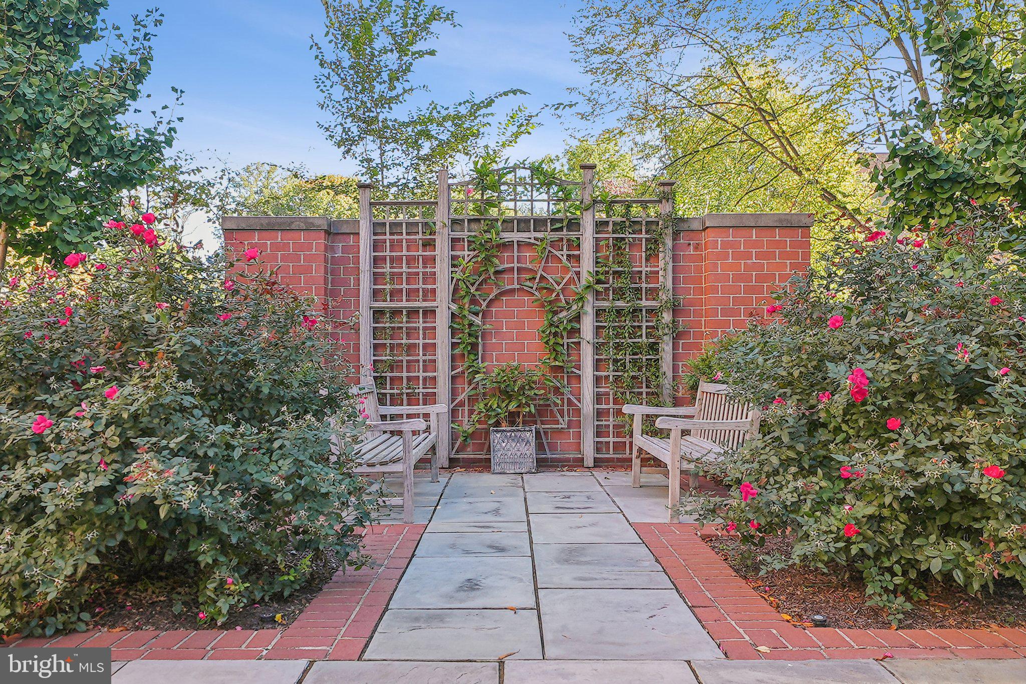 502 West Broad Street, Unit 215 Falls Church, VA 22046 - Photo 35 of 40 a view of a pathway with flower garden