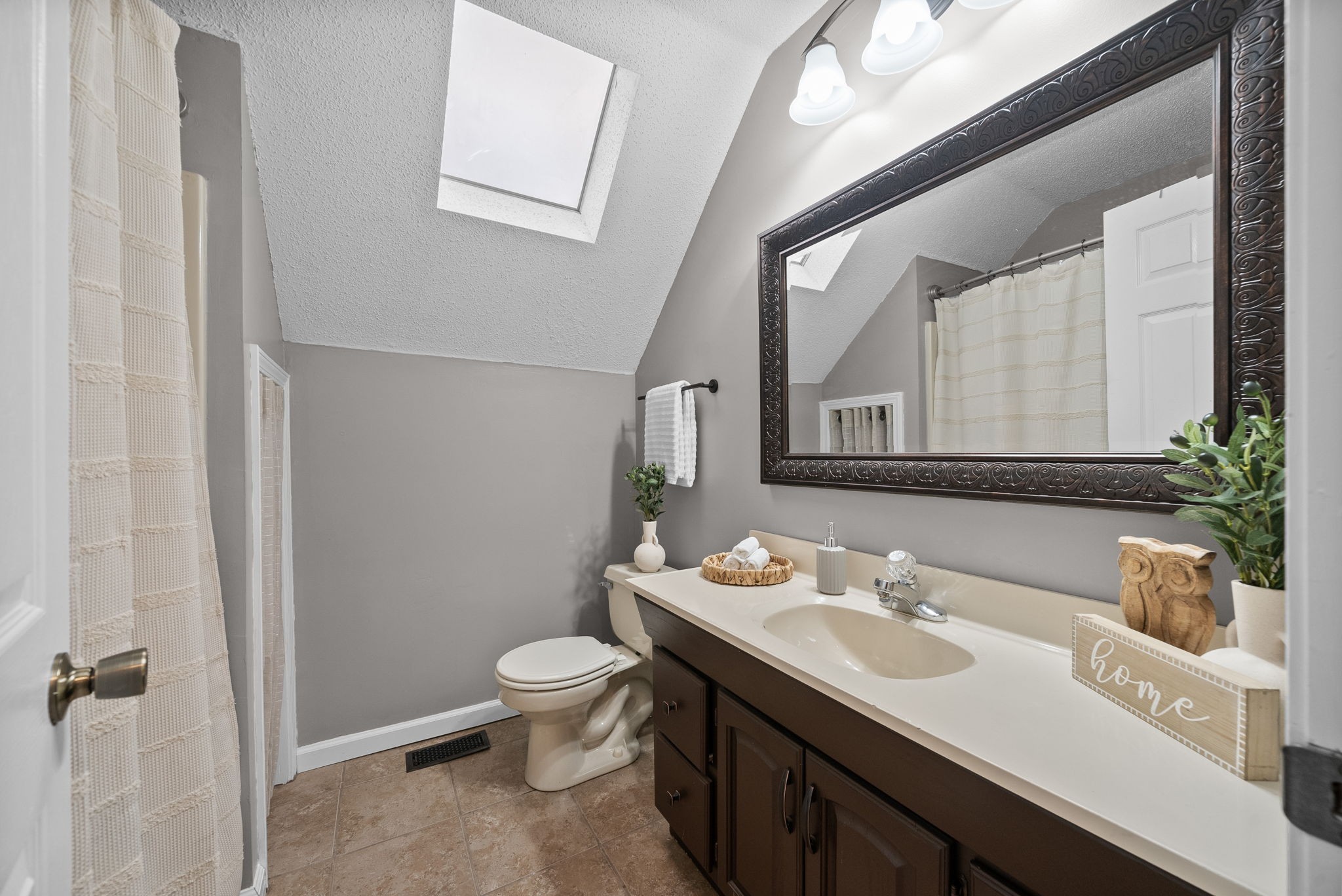 2430 Underwood Road Cunningham, TN 37052 - Photo 27 of 49 a bathroom with a sink and a mirror