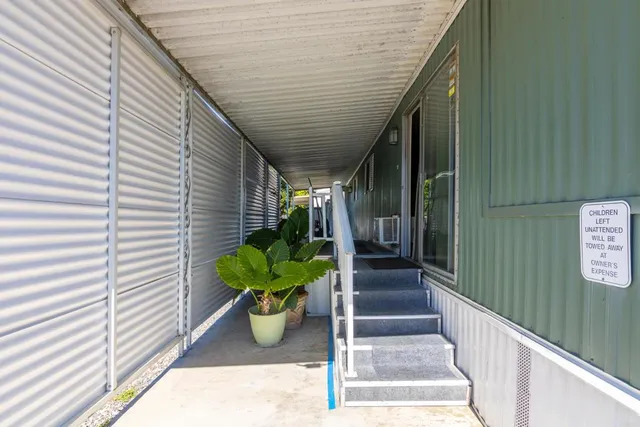 a view of a entryway door front of house