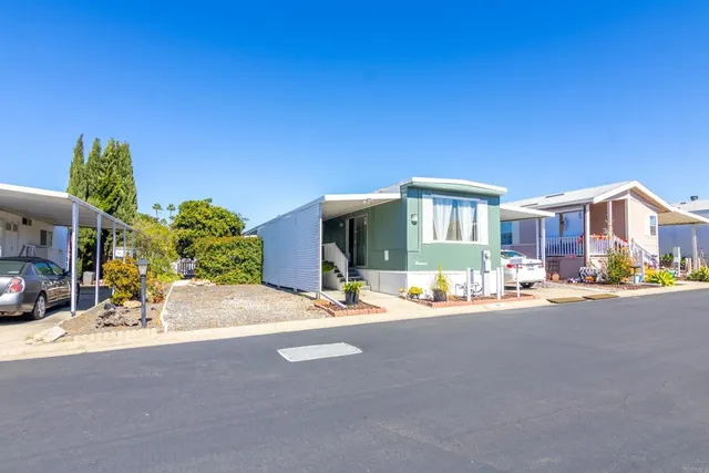 a view of a street with a building and a street