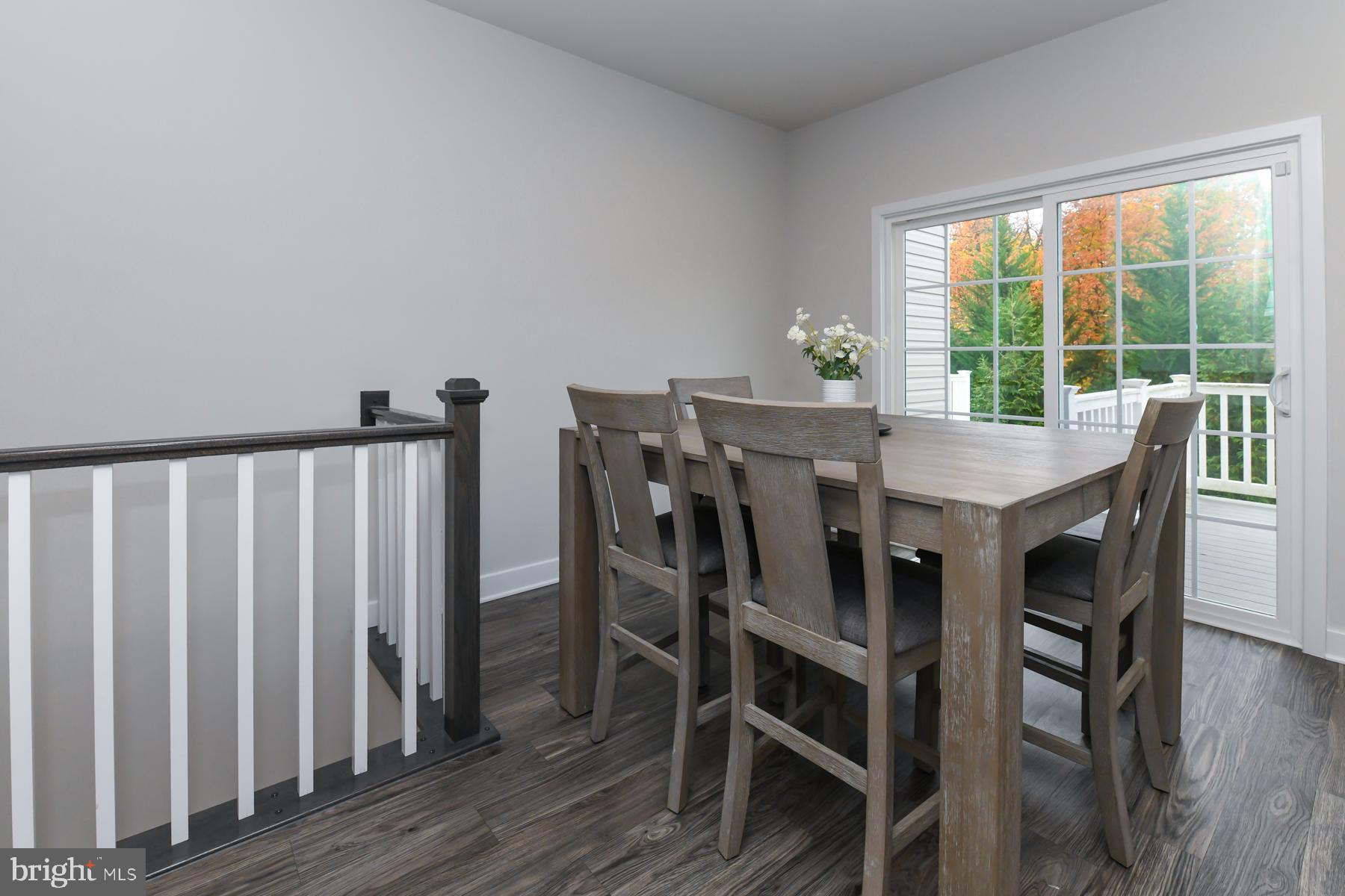 28 Peacock Circle Sewell, NJ 08080 - Photo 11 of 25 a view of a dining room with furniture and wooden floor